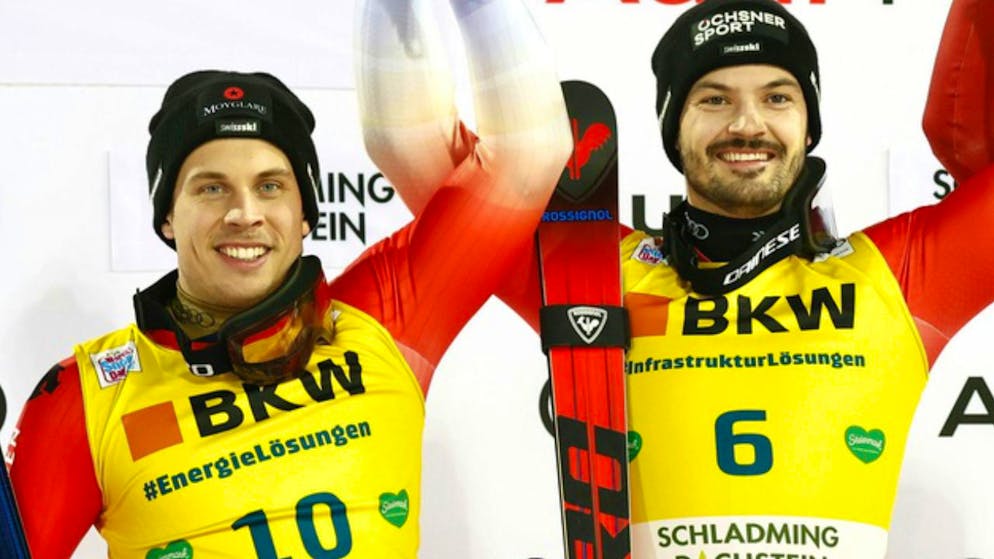 Loïc Meillard und Gino Caviezel bejubeln ihren Doppelsieg im Riesenslalom von Schladming.