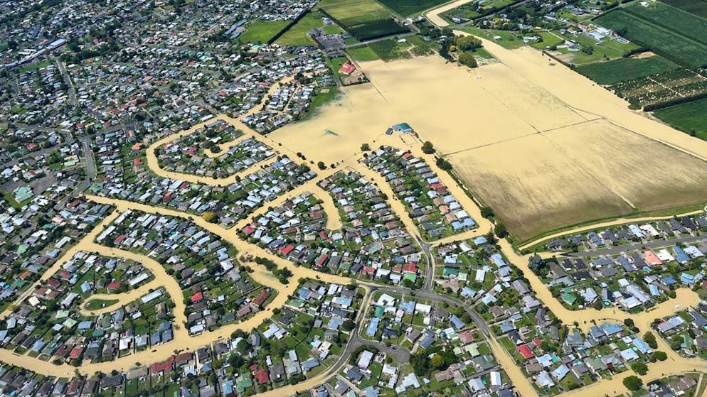 A supplied image shows an overhead view of the floodwaters from Cyclone Gabrielle in suburban Napier, on Thursday, February 26, 2023. (AAP Image/Supplied by the New Zealand Defence Force) NO ARCHIVING, EDITORIAL USE ONLY