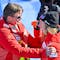 Jasmine Flury of Switzerland, right, and Urs Lehmann, president of swiss ski celebrate in the finish area during the women's downhill race at the 2023 FIS Alpine Skiing World Championships in Courchevel/Meribel, France, Saturday, February 11, 2023. (KEYSTONE/Jean-Christophe Bott)