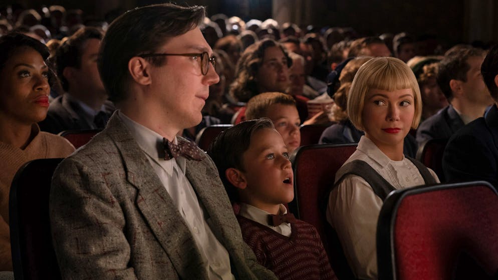 (from left) Burt Fabelman (Paul Dano), younger Sammy Fabelman (Mateo Zoryan Francis-DeFord) and Mitzi Fabelman (Michelle Williams) in The Fabelmans, co-written and directed by Steven Spielberg.