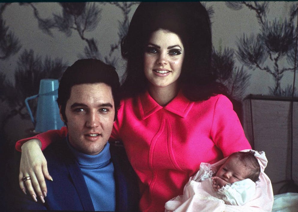 FILE -Elvis Presley poses with wife Priscilla and daughter Lisa Marie, in a room at Baptist hospital in Memphis, Tenn., on Feb. 5, 1968. Lisa Marie Presley, a singer, Elvis' only daughter and a dedicated keeper of her father's legacy, died Thursday, Jan. 12, 2023 after being hospitalized for a medical emergency. (AP Photo/File)
