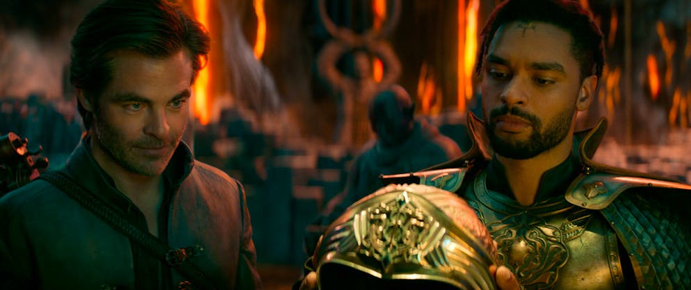 Chris Pine stars in Dungeons & Dragons.  Edgin's (Chris Pine) relationship with paladin Xenk (Regé-Jean Page) makes for a lot of laughs in the movie. 