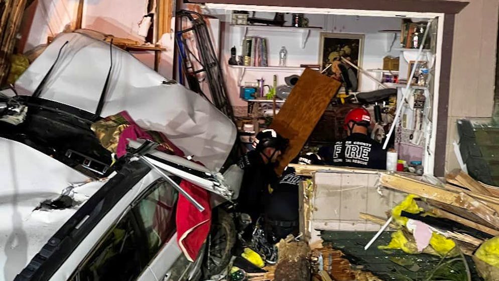 The car crashed into a bedroom and landed on a porch.