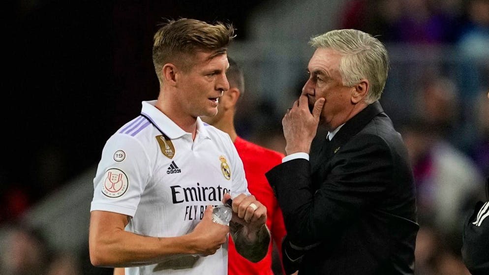 The relaxed pragmatist on Real Madrid's dugout - Gallery.  Ancelotti exchanges ideas with Toni Kroos