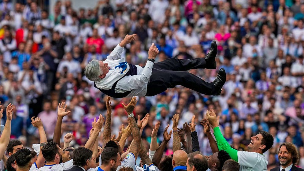 The relaxed pragmatist on Real Madrid's dugout - Gallery.  Ancelotti is loved by his players, and this is where the team celebrate him after last year's league title