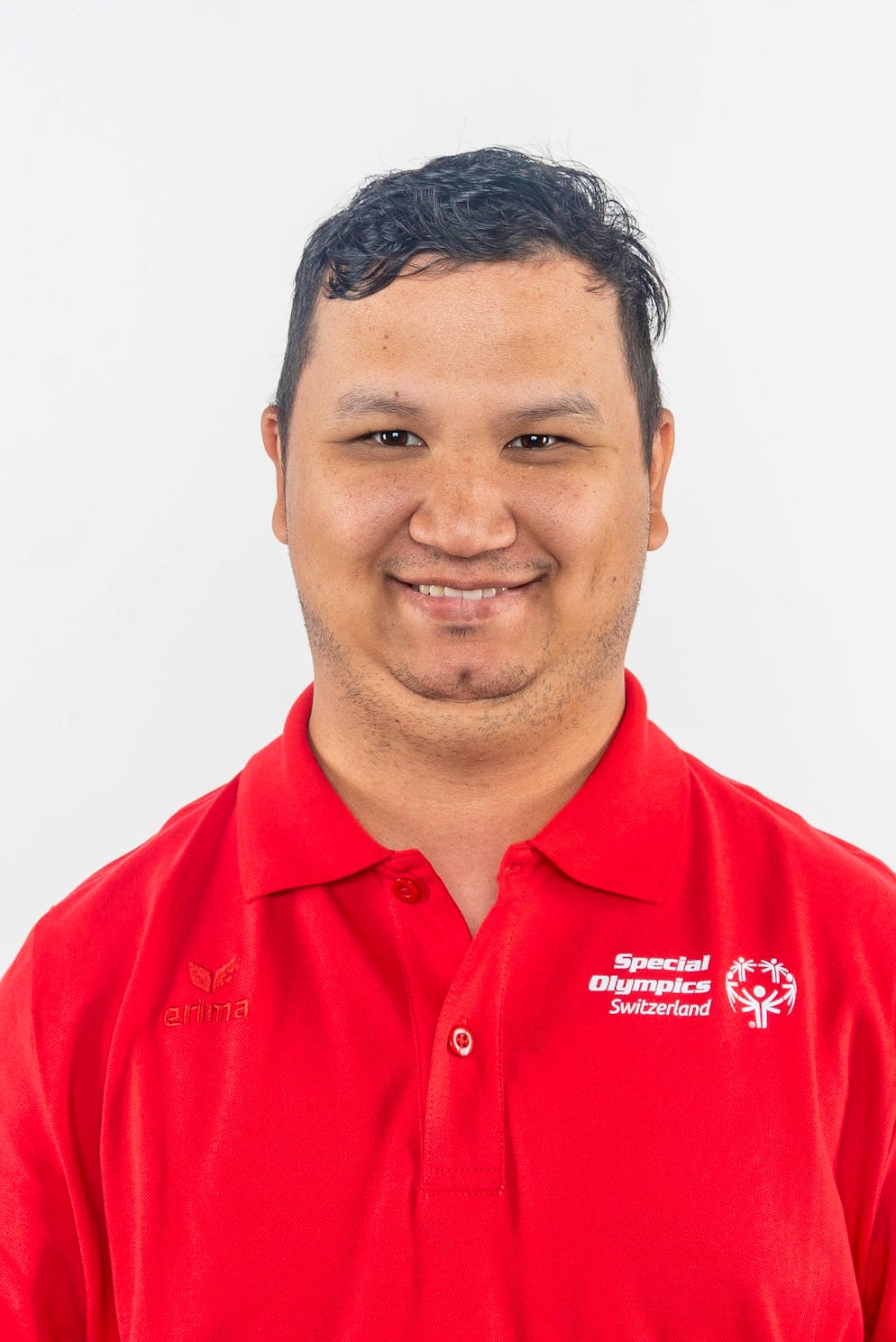 Special Olympics.  Abduvali Numano (29 ans): Pour le trouver, il suffit de chercher son vélo, raconte l’athlète de 29 ans. «Je suis ravi de jouer au football et de découvrir la ville.»