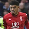 Nottingham Forest's Morgan Gibbs-White, right, challenges for the ball with Manchester City's Jack Grealish during the English Premier League soccer match between Nottingham Forest and Manchester City at City ground in Nottingham, England, Saturday, Feb. 18, 2023. (AP Photo/Rui Vieira)