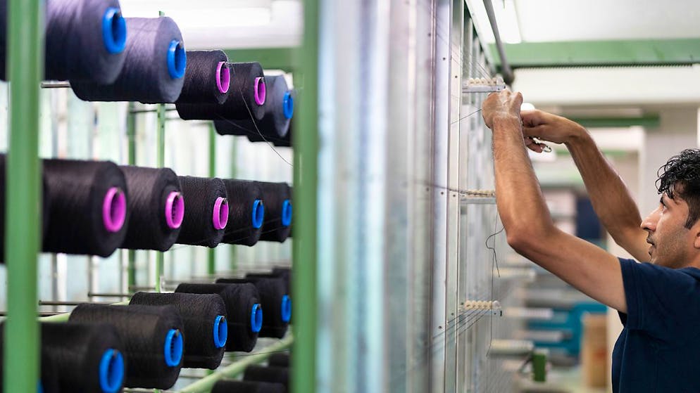 Dans l'industrie textile en Suisse, il est extrêmement difficile de recruter du personnel qualifié, a indiqué le président de Swiss Textiles Carl Illi (photo d'illustration).