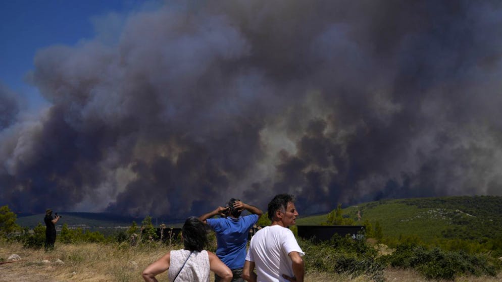 Prosegue l'emergenza degli incendi boschivi scoppiati in diverse aree del territorio ellenico. Nella foto Pournari, vicino ad Atene.
