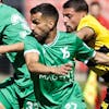 Young Boys' midfielder Kastriot Imeri, right, fights for the ball with Yverdon's defender Anthony Sauthier, left, and Yverdon's forward Varol Tasar, centre, during the Super League soccer match of Swiss Championship between Yverdon Sport FC and BSC Young Boys, at the Stade de la Maladiere stadium, in Neuchatel, Switzerland, Sunday, July 30, 2023. (KEYSTONE/Salvatore Di Nolfi)