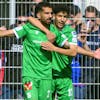 L'attaquant yverdonnois Varol Tasar, gauche, celebre son but du 1 a 0 avec le defenseur yverdonnois Haithem Loucif, centre, et le milieu yverdonnois Igor Liziero, droite, lors de la rencontre de football de Super League entre le Yverdon Sport FC et le FC Basel 1893 ce dimanche 24 septembre 2023 au stade Municipal d'Yverdon-les-Bains. (KEYSTONE/Laurent Gillieron)