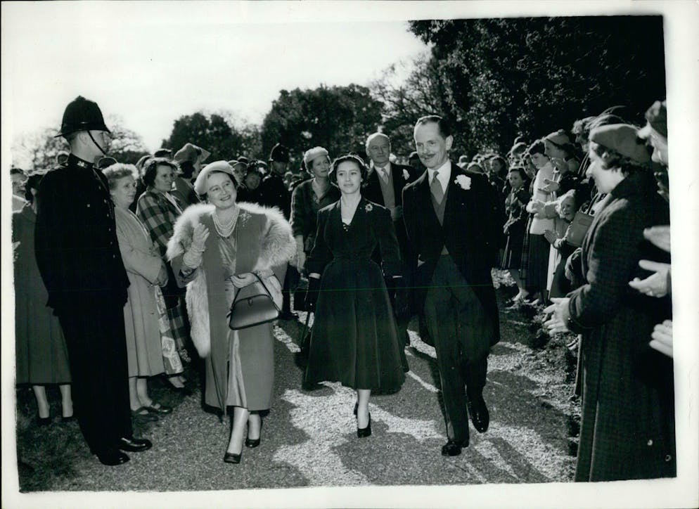 Lady Anne Glenconner (centre) was already in the service of Queen Mum (left), Queen Elizabeth's mother.  This photo was taken on April 4, 1956.