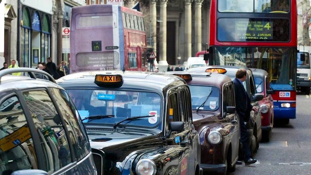 Some of London's popular black taxis will be available to book through the Uber platform from January.  (Archives)