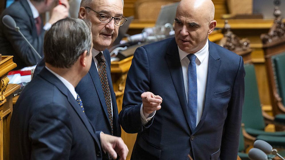 L'elezione del Consiglio federale del 13 dicembre 2023. Il presidente della Confederazione Alain Berset, immortalato assieme al suo collega Guy Parmelin e al presidente del Centro Gerhard Pfister tamattina in aula