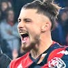 epa10969084 Genoa's Radu Dragusin celebrates after the Italian Serie A match Genoa CFC vs Hellas Verona at Luigi Ferraris stadium in Genoa, Italy, 10 November 2023. Genoa won the match 1-0. EPA/LUCA ZENNARO