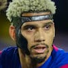 epa11039000 Barcelona's Uruguayan defender Ronald Araujo (R) in action against Almeria's defender Edgar (L) during the Spanish LaLiga soccer match between FC Barcelona and UD Almeria at Montjuic Olympic Stadium in Barcelona, Catalonia, Spain, 20 December 2023. EPA/Enric Fontcuberta