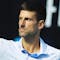 epa11104925 Novak Djokovic of Serbia reacts during his Men's semi final match against Jannik Sinner of Italy at the Australian Open tennis tournament in Melbourne, Australia, 26 January 2024. EPA/MAST IRHAM