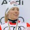 Switzerland's Lara Gut Behrami poses with the alpine ski, women's World Cup overall trophy, in Saalbach, Austria, Saturday, March 23, 2024. (AP Photo/Alessandro Trovati)