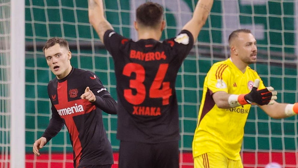 Granit Xhaka jubelt nach dem Treffer von Florian Wirtz und über einen nie gefährdeten Sieg gegen Düsseldorf, der Leverkusen in den deutschen Cupfinal bringt.