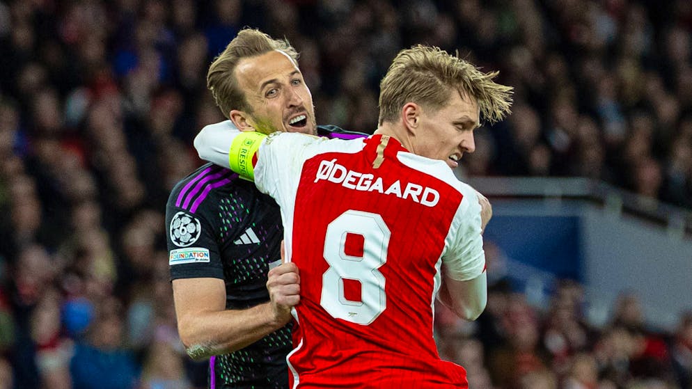 Harry Kane im Duell mit Martin Ödegaard.