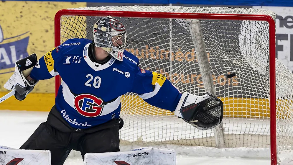 Viel Rauch, wenig Feuer beim Drachen - Gallery. Gut, aber nicht überragend: Reto Berra konnte seinem Team zu wenig helfen