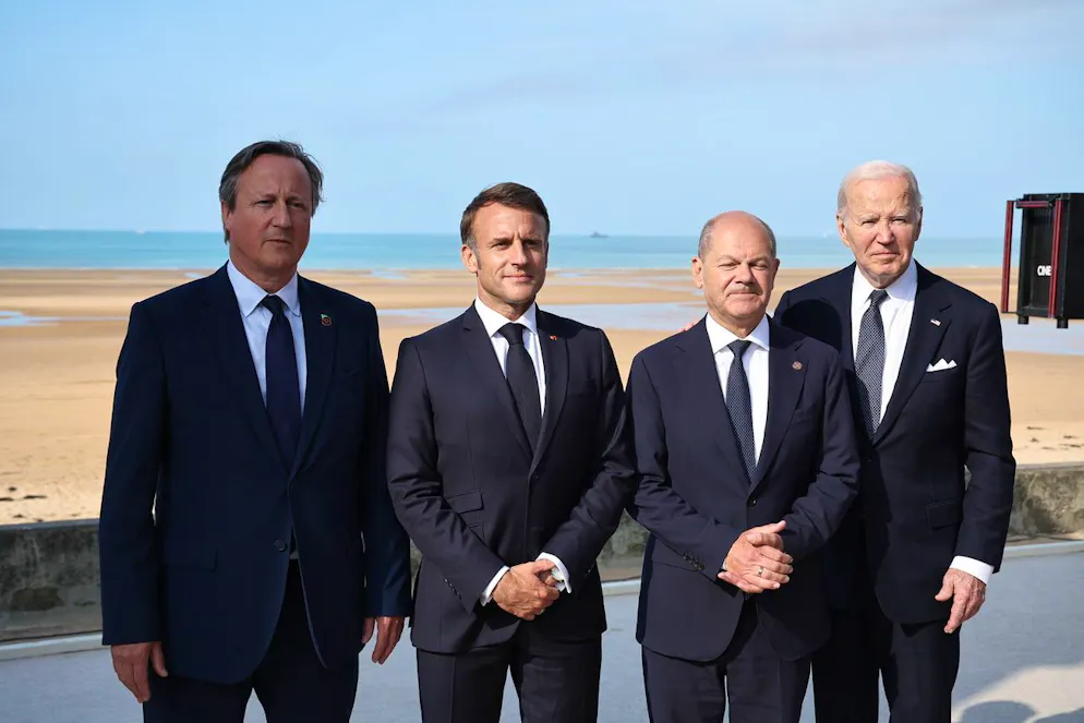 (Da sinistra) il ministro degli Esteri britannico David Cameron, il presidente francese Emmanuel Macron, il cancelliere tedesco Olaf Scholz e il presidente degli Stati Uniti Joe Biden.