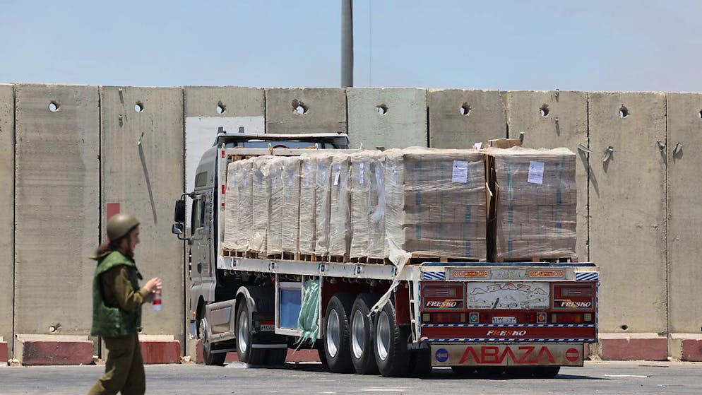L'armée israélienne annonce des "pauses tactiques" afin d'accroître le volume d'aide humanitaire au point d'entrée de Kerem Shalom au sud de la bande de Gaza (archives)