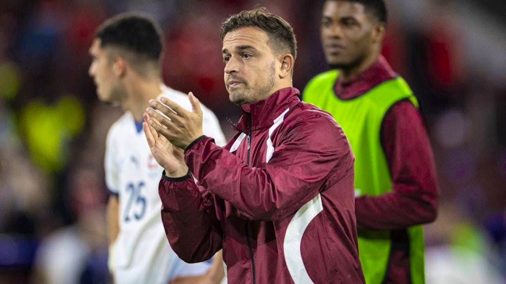 Xherdan Shaqiri is celebrated by the fans after the game against Scotland.