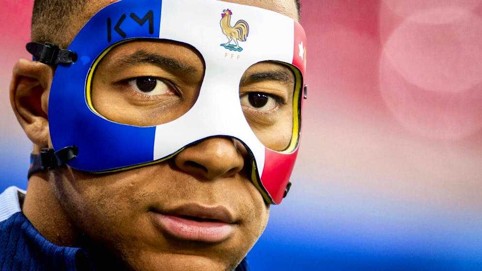 The day before the Holland game, Kylian Mbappé shows off his new face mask.