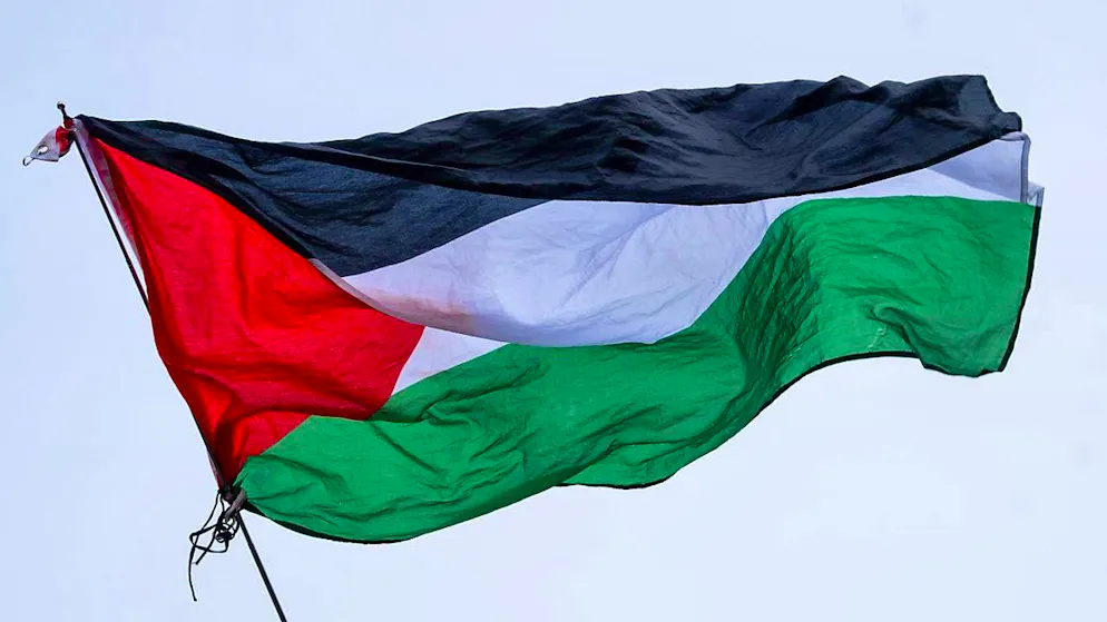 ARCHIVE - The flag of Palestine waved at a pro-Palestinian rally. Photo: Monika Skolimowska/dpa