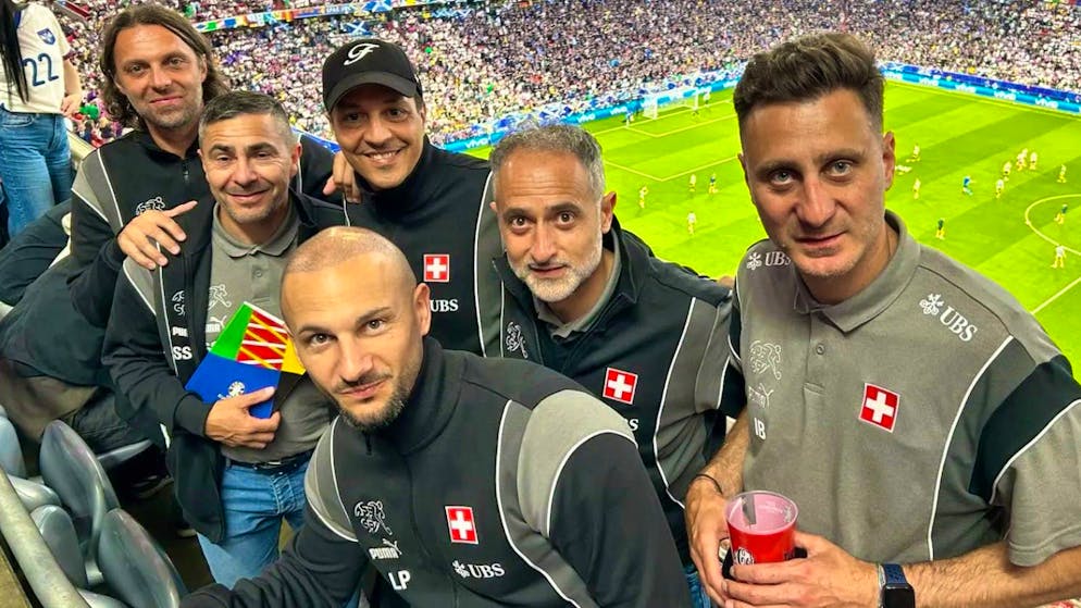 Victims, not perpetrators: the Swiss analysis team follows a match in the stadium.