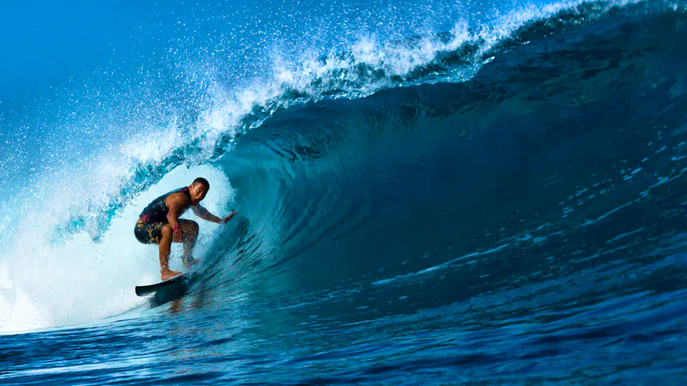 Tamayo Perry surfs off Hawaii.