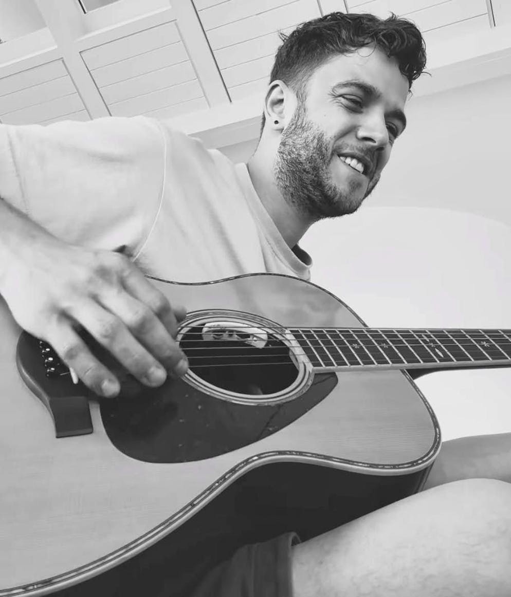 Luca sings for his newborn daughter.