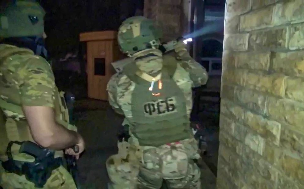 Russian anti-terrorist unit at work in Derbent in the early morning of June 24.