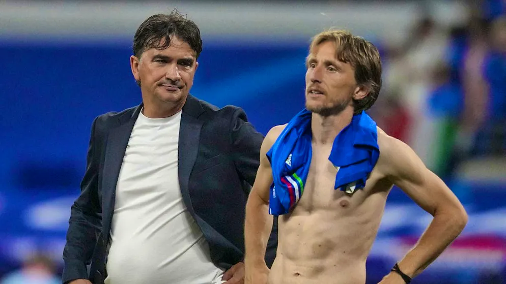 The sting runs deep for head coach Zlatko Dalic (left) and Luka Modric.