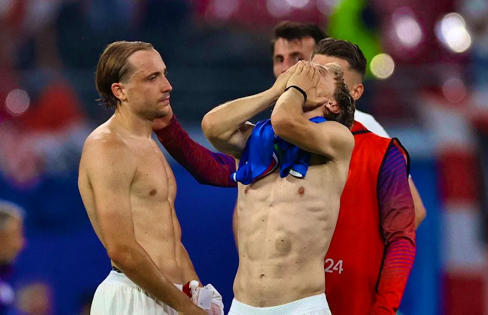 epa11435491 Luka Modric of Croatia (C) and teammates react after the UEFA EURO 2024 group B soccer match between Croatia and Italy, in Leipzig, Germany, 24 June 2024. EPA/FILIP SINGER