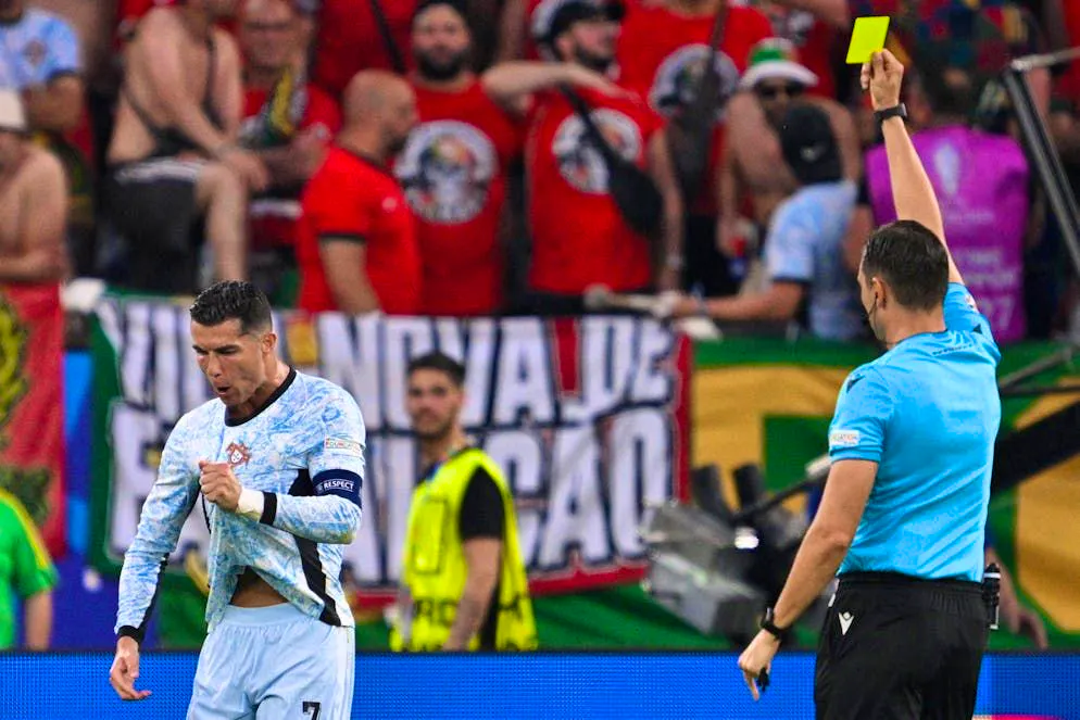 Yellow card instead of penalty. Ronaldo and Swiss referee Sandro Schärer clash