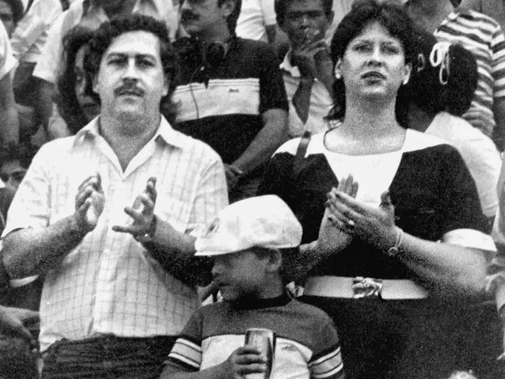 Pablo Escobar, head of the Medellin drug cartel, with his wife Victoria Henau Vallejos and son attending a football match in Bogota.