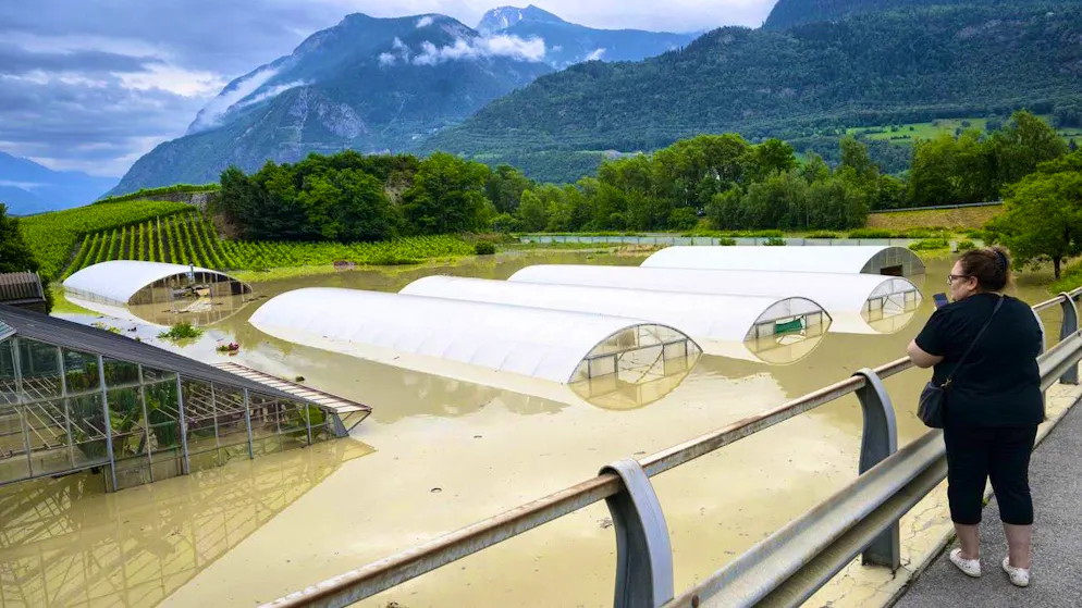Devastating storm in southwestern Switzerland. In Sierre/Siders, the Rhone burst its banks on June 30.