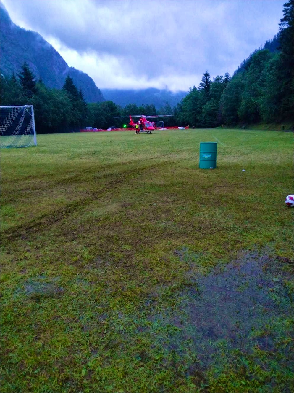 Evacuation from Piano di Peccia in the rear Maggia Valley. Rega lands on the football pitch at around 5.30 am.