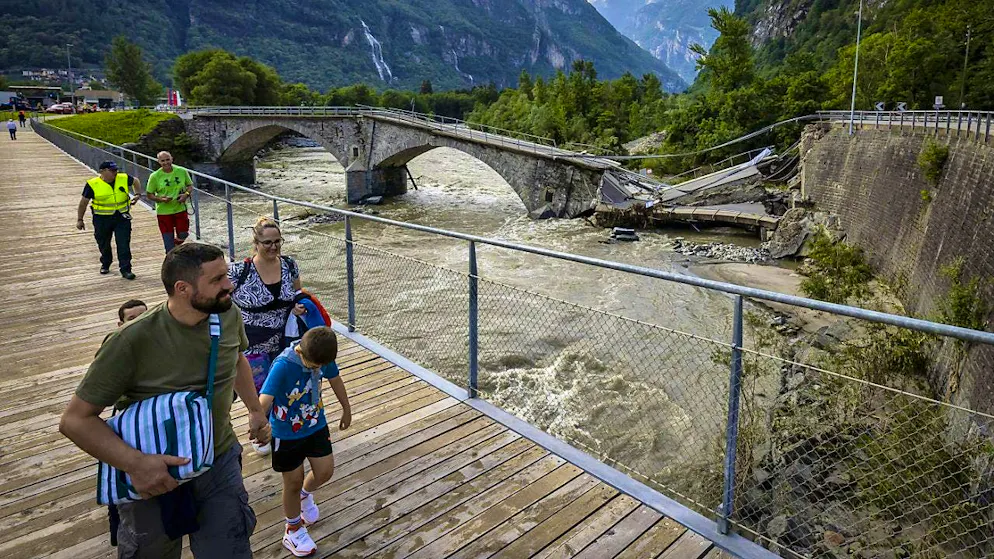 The bicycle and pedestrian bridge (pictured in front) has been temporarily opened to limited car traffic.