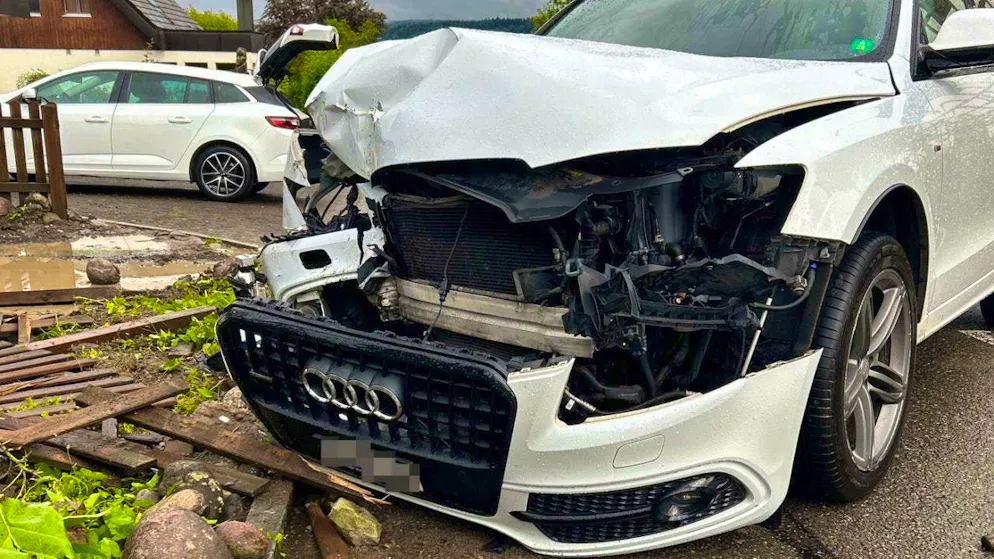 The badly damaged car after the accident of a mother who was driving with her baby in the passenger seat.