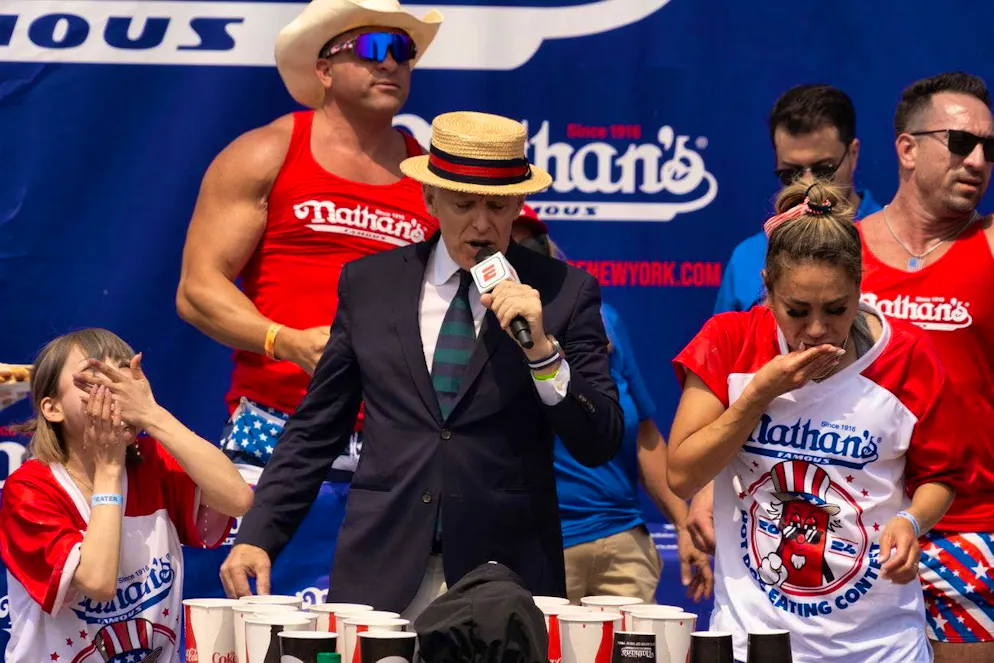 Miki Sudo (R) competes against Mayoi Ebihara (L) during the Nathan's Famous Fourth of July International Hot Dog Eating Contest on Coney Island in the Brooklyn borough of New York.