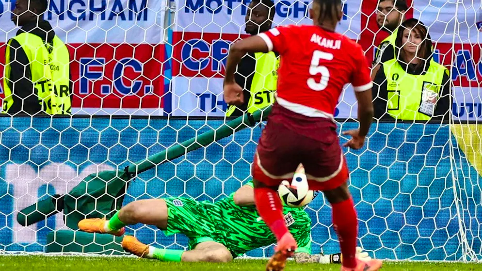Jordan Pickford saves Manuel Akanji's penalty.