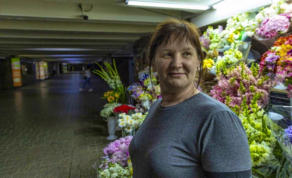 Olha Seminog sells flowers in a Kiev underpass. The photo was taken on June 25.