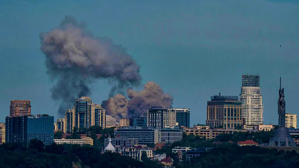 Smoke rises over the skyline of the Ukrainian capital Kiev after a Russian missile attack. Photo: Evgeniy Maloletka/AP