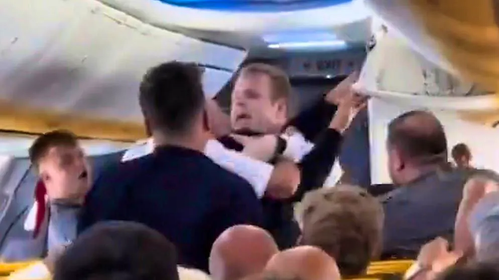 Video shows incident. Plane has to make a stopover due to brawl
