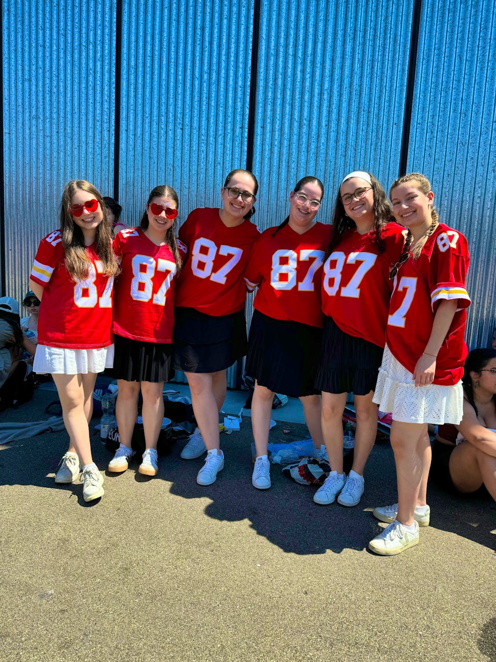 The best outfits at the Taylor Swift concert. Six young women with an "87" shirt - this is the number worn by NFL star and Swift's boyfriend Travis Kelce. 