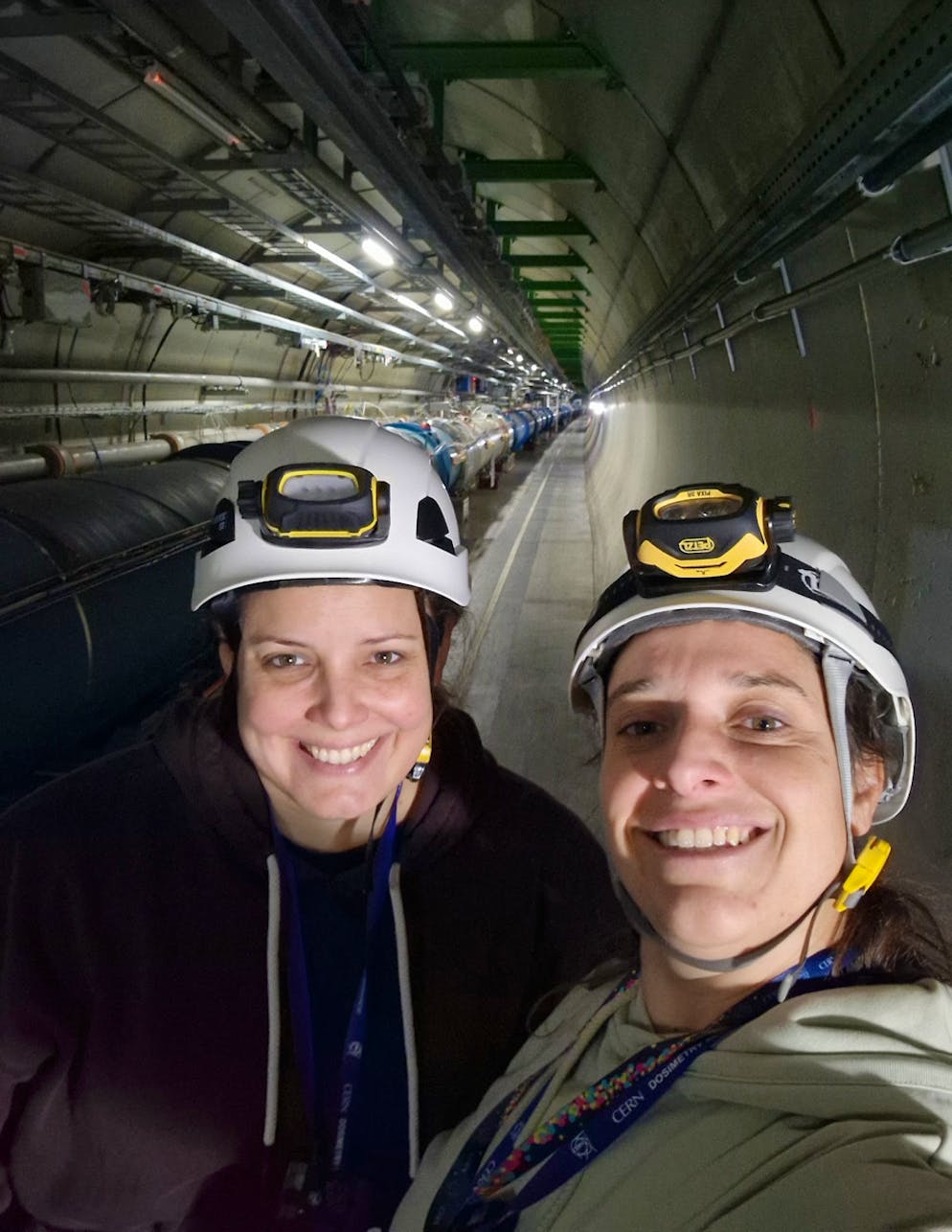 Catherine Bernius with colleague Dr. Silvia Franchino in the LHC tunnel at CERN. 