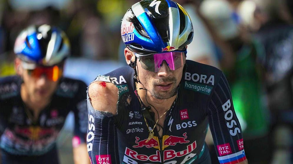 Primoz Roglic crosses the finish line with injuries